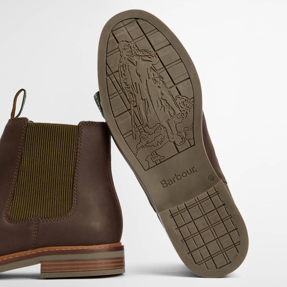 Brown leather boot with visible brand logo